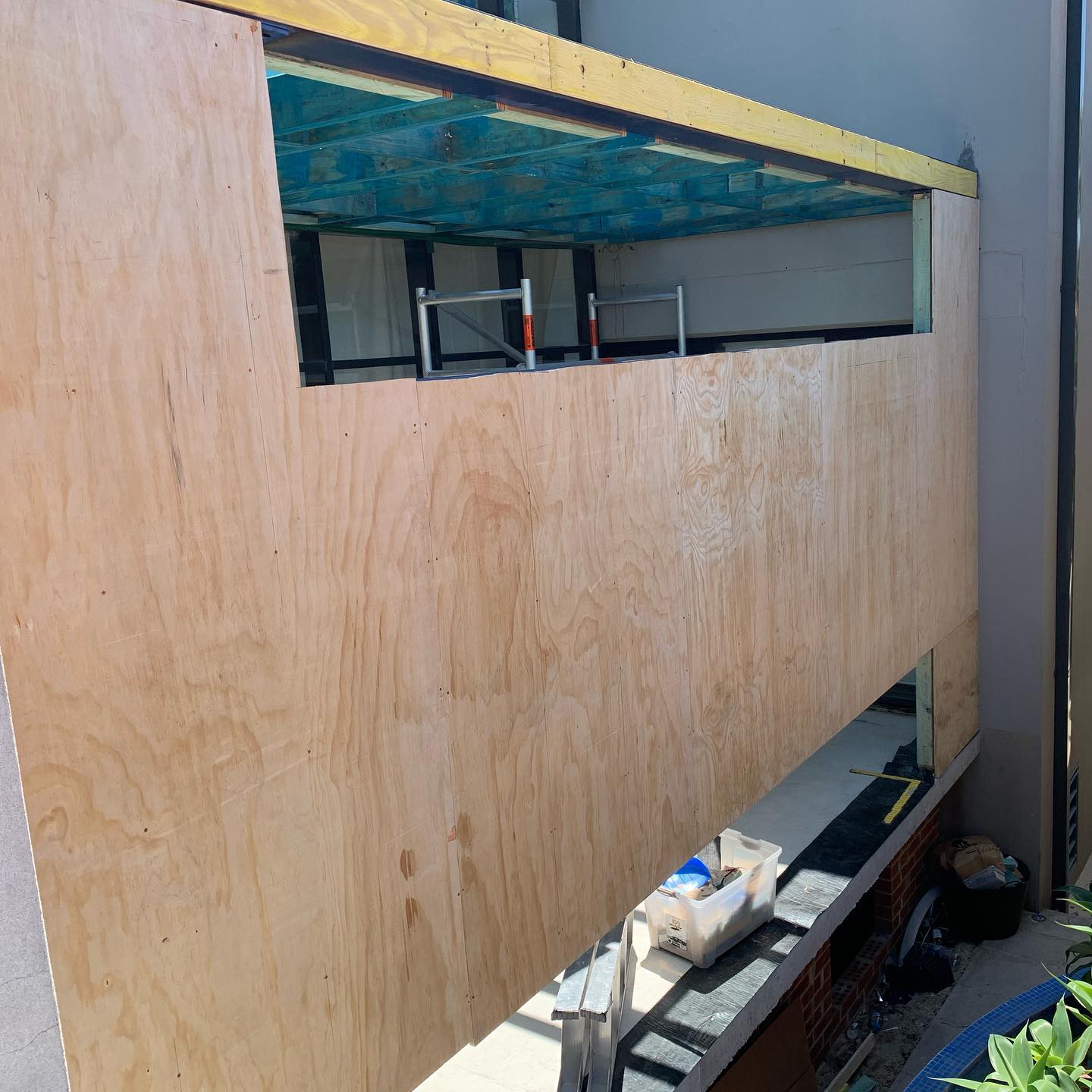 Carpentry: plywood sheathing and structural timber on a building in progress