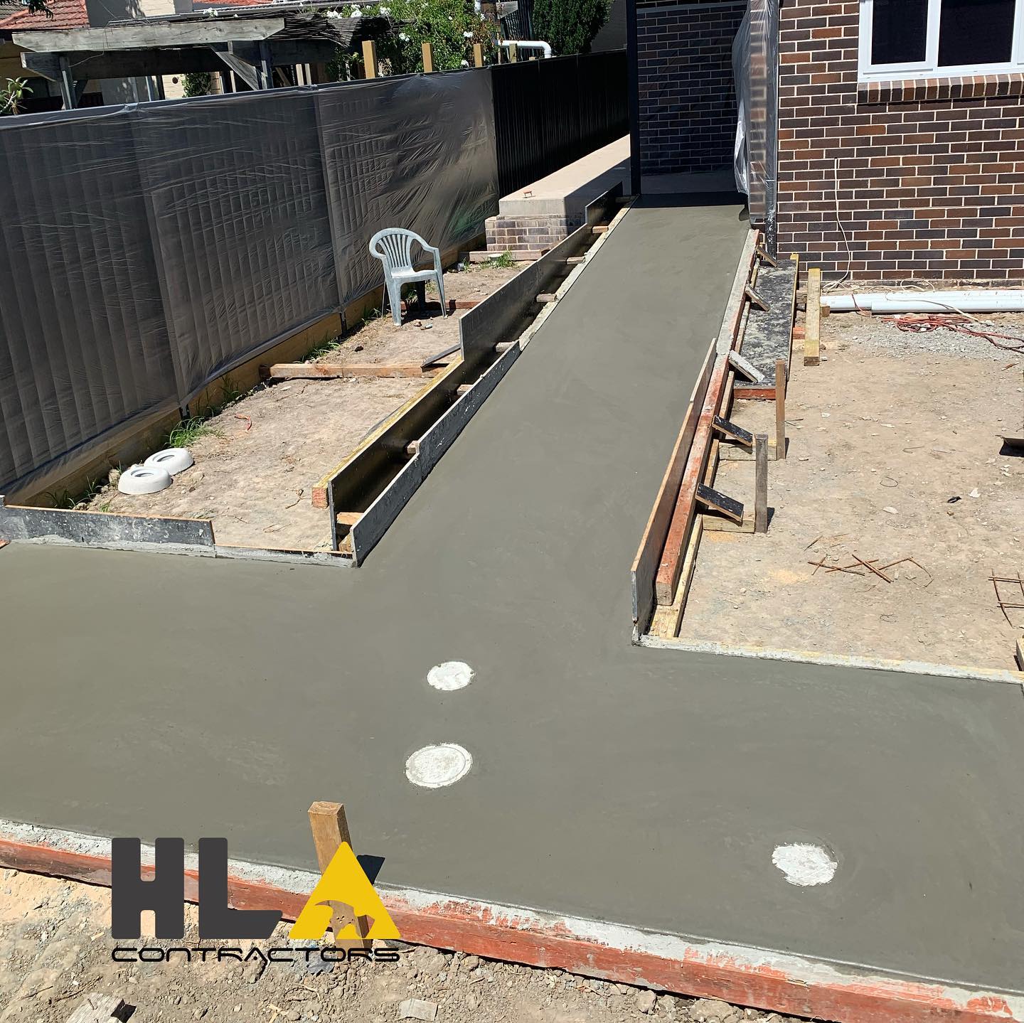 New concrete path and kerb with clean arris and crossover